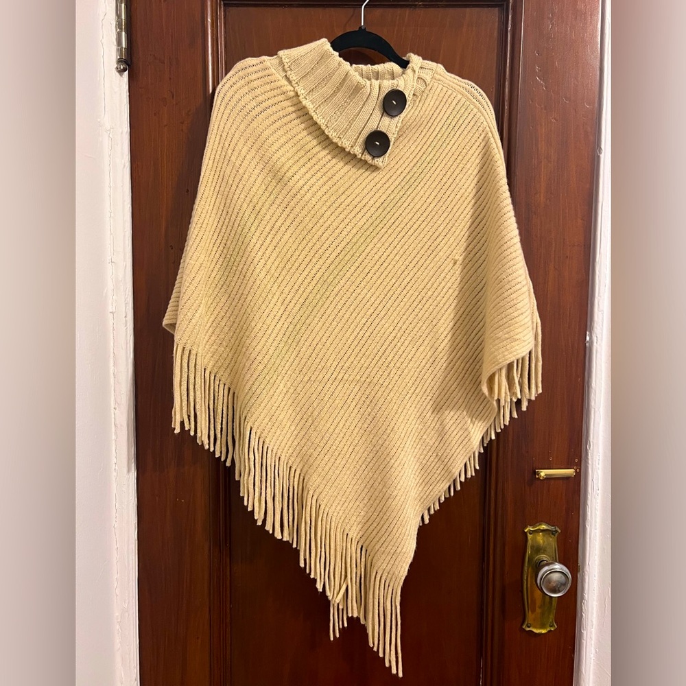 Knit poncho with buttons